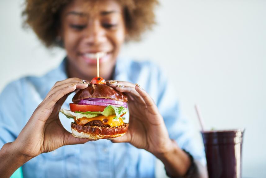 woman eating a burger