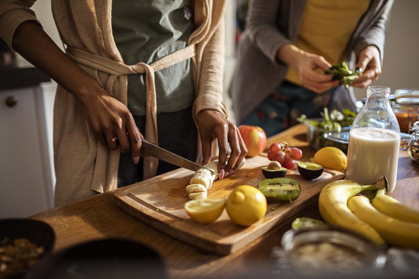 Two people cooking