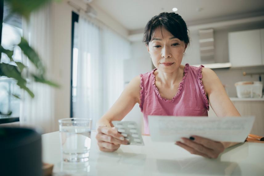 Woman looking at paper